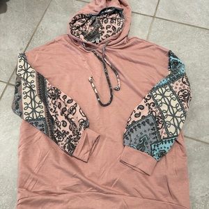 Blush pink sweatshirt with printed balloon sleeves